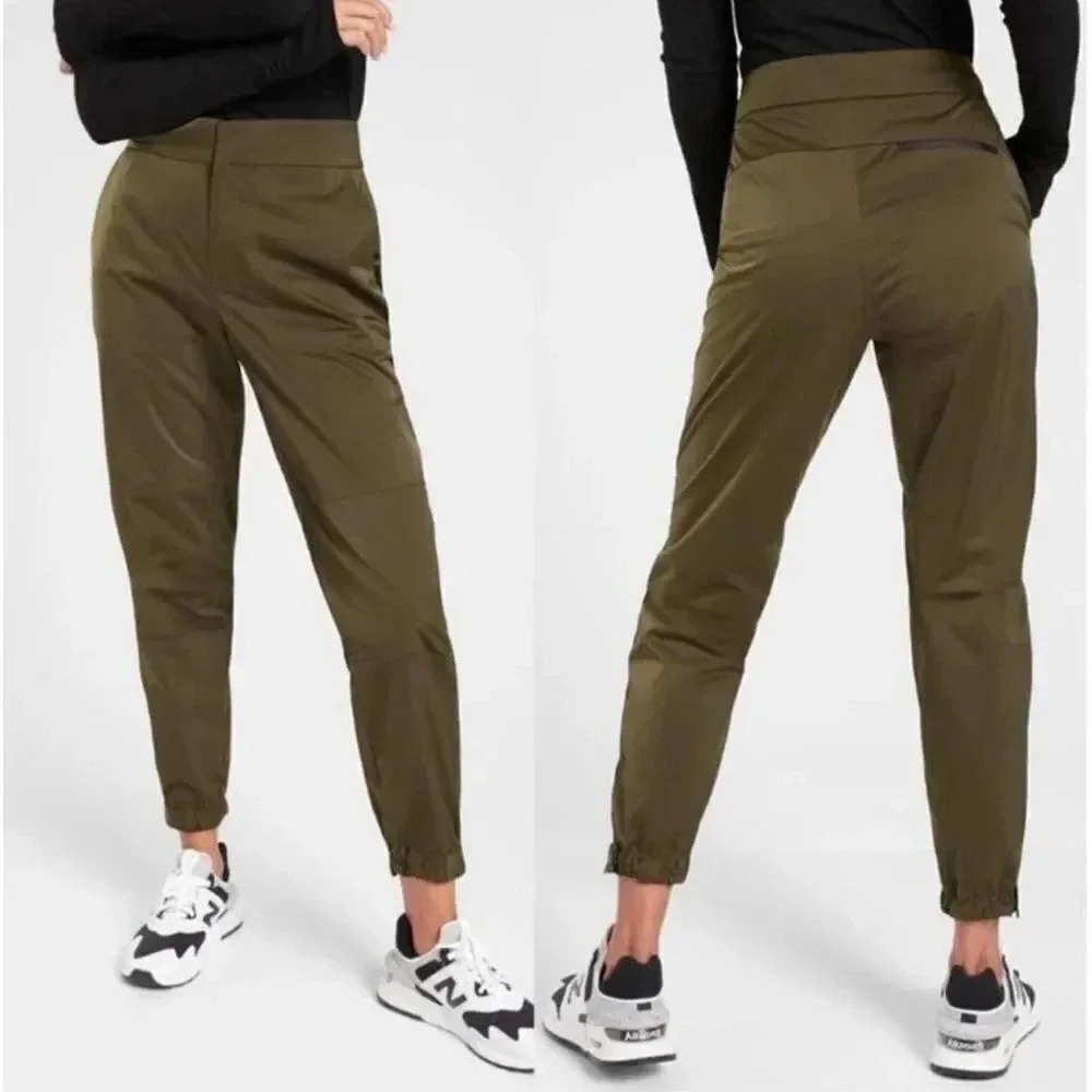 Athleta Woman’s Size 8T Radiant Jogger Tool Pants Tortuga Olive Green Shiny Size